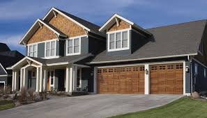 Clopay Coachman carriage house garage door with decorative windows